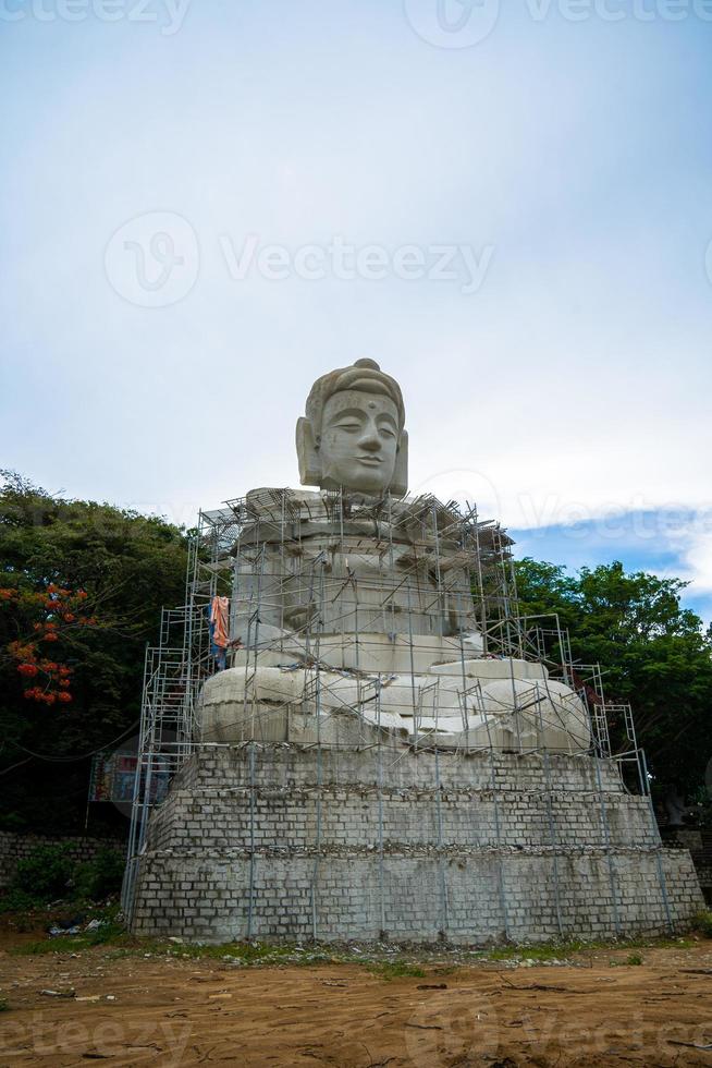 Buddhist Temple in Vietnam , Mot Hon  Linh Quang Monastery. Beauty architecture leads to Lord Buddha statue, which attracts tourists to visit spiritually on weekends photo