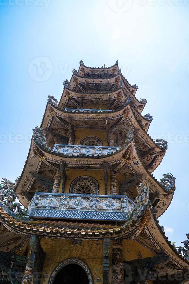 Linh Phuoc Pagoda in Da Lat, Vietnam. Dalat's famous landmark, buddhist porcelain glass temple. Linh Phuoc Pagoda in Dalat Vietnam also called Dragon Pagoda. photo