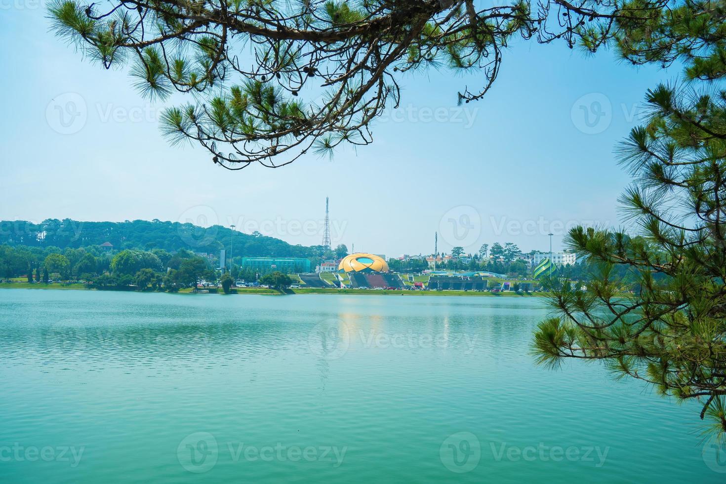 Fabulous sunrise by Xuan Huong Lake, in center Da Lat City, Lam Dong Province, Vietnam. This artificial lake in the city centre is a favourite place for tourists and locals for walking. photo