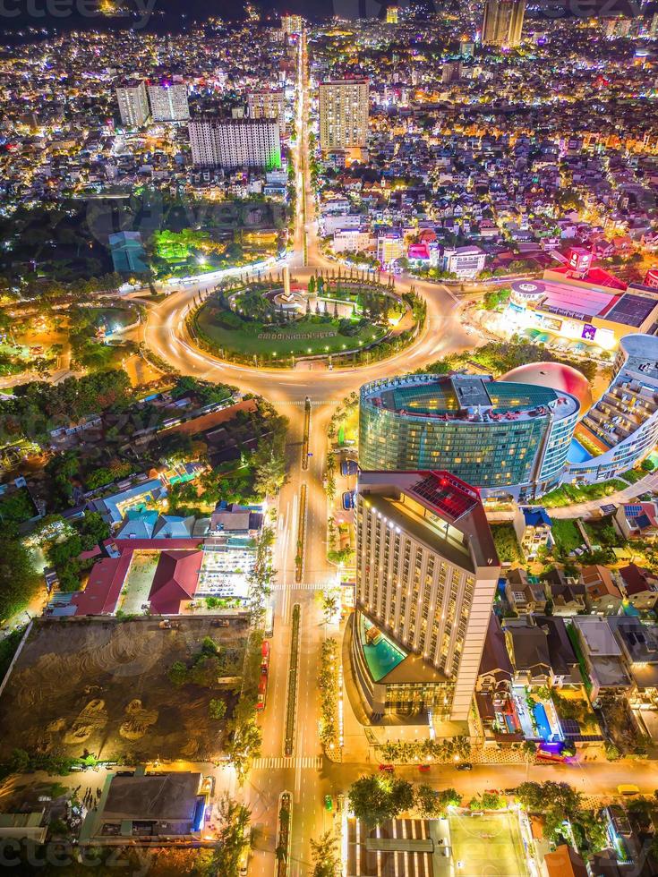 Panoramic coastal Vung Tau view from above, with traffic roundabout, house, Vietnam war memorial in Vietnam. Long exposure photography at night. photo
