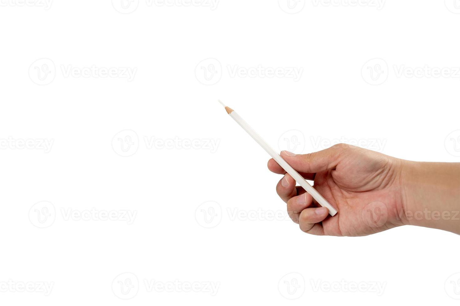 Isolated Asian man's right hand holds one colour pencil for drawing and painting somthing on white background. Clipping path. photo