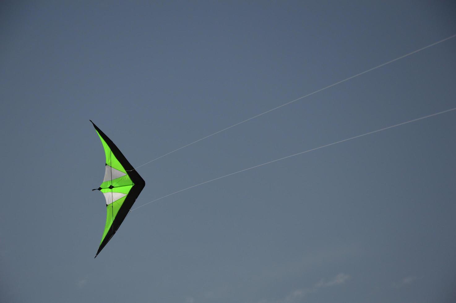 A steering kite in the blue sky photo