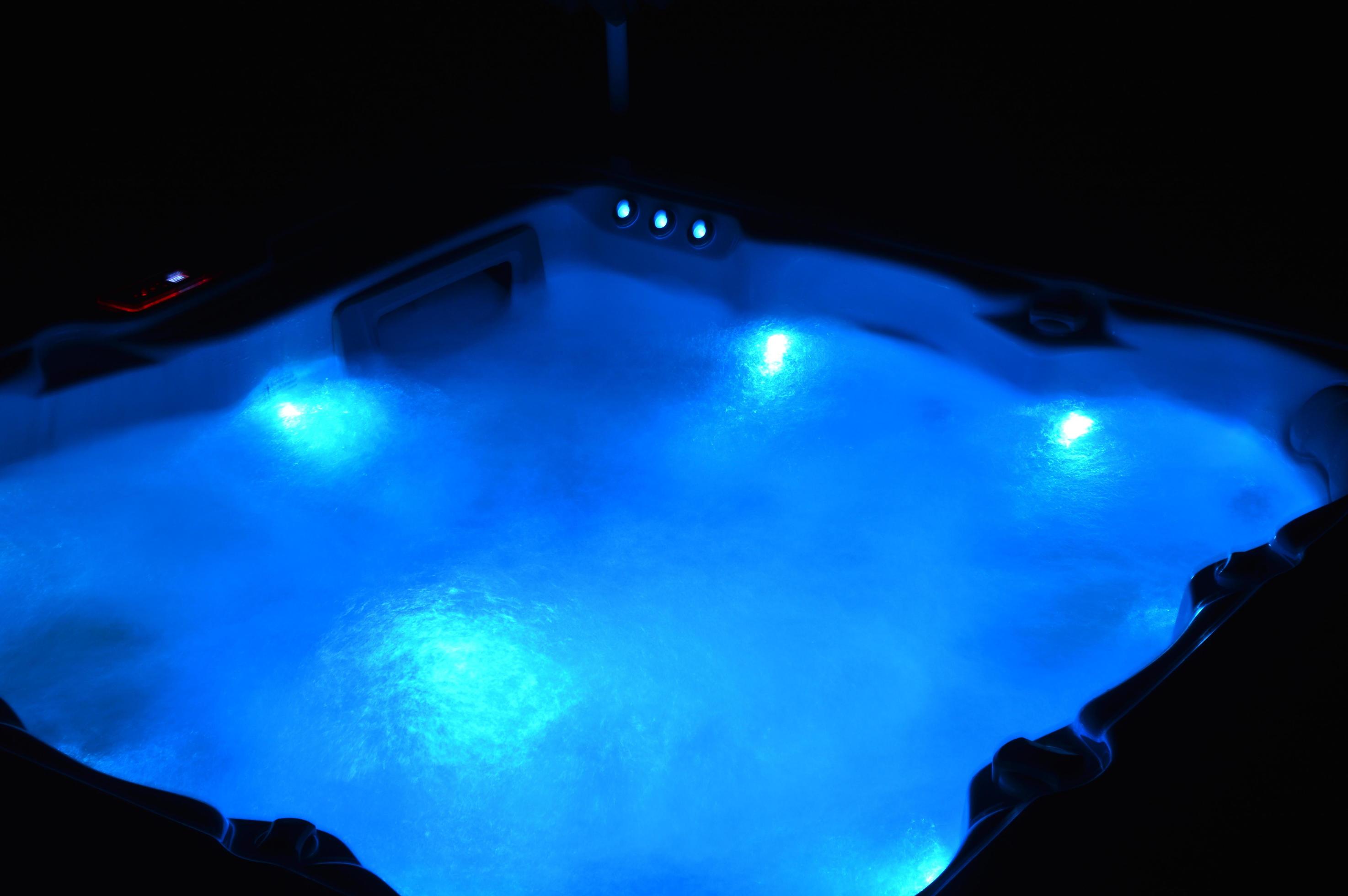 View on a spa at night, Hot tub at night 8357849 Stock Photo at Vecteezy