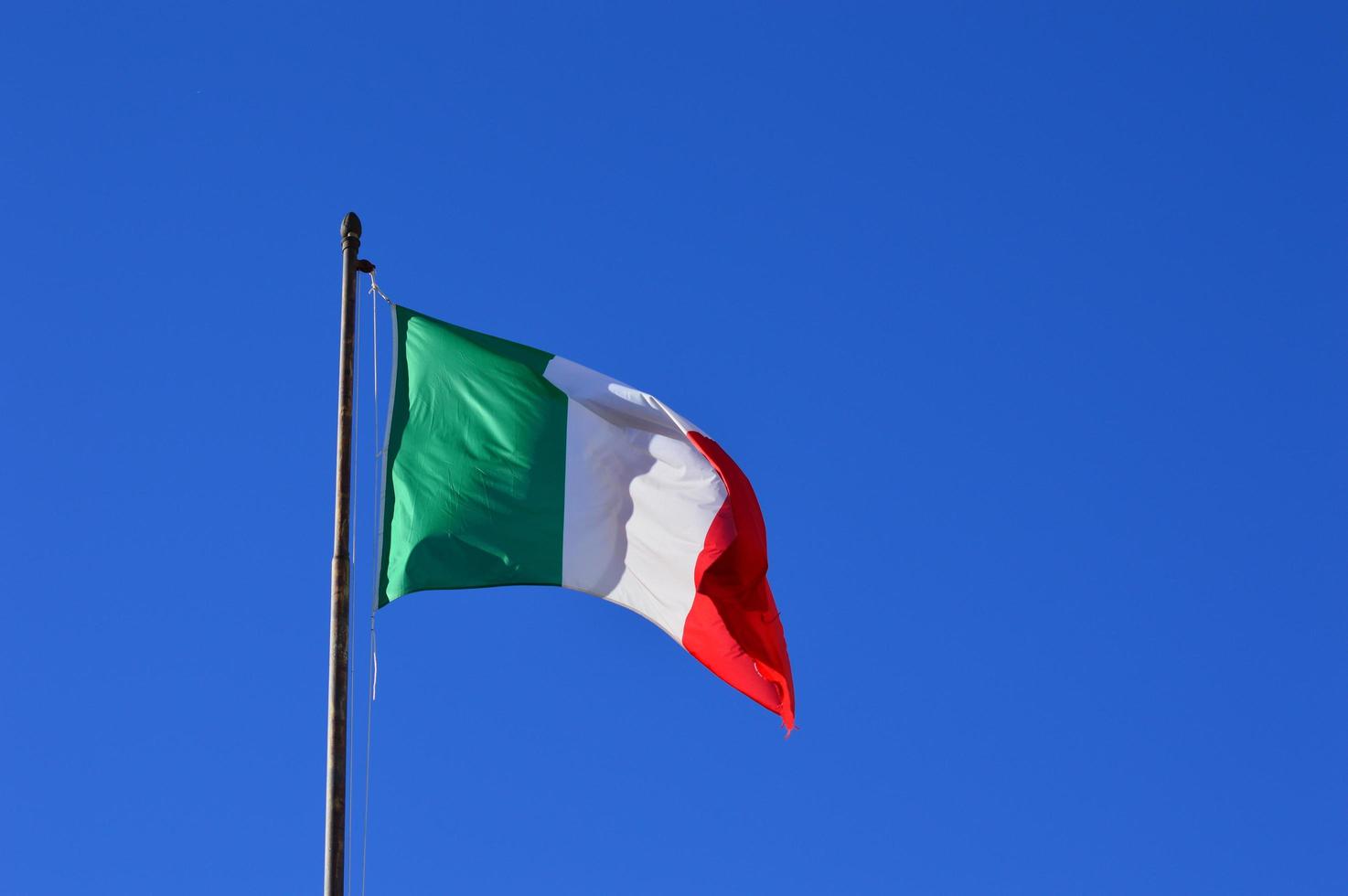 Italian flag in the wind photo