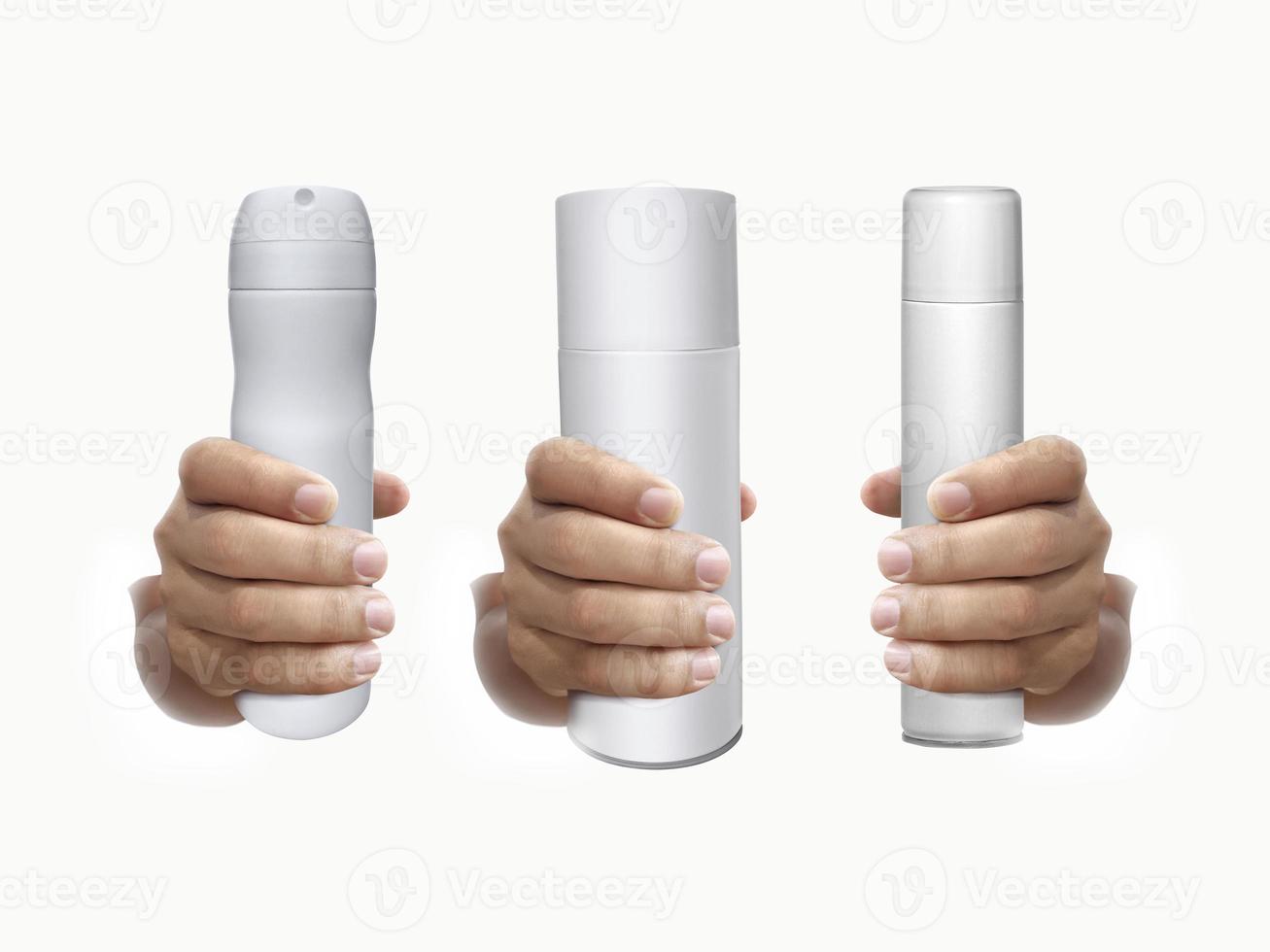 holding spray bottle on hand isolated on a white background photo