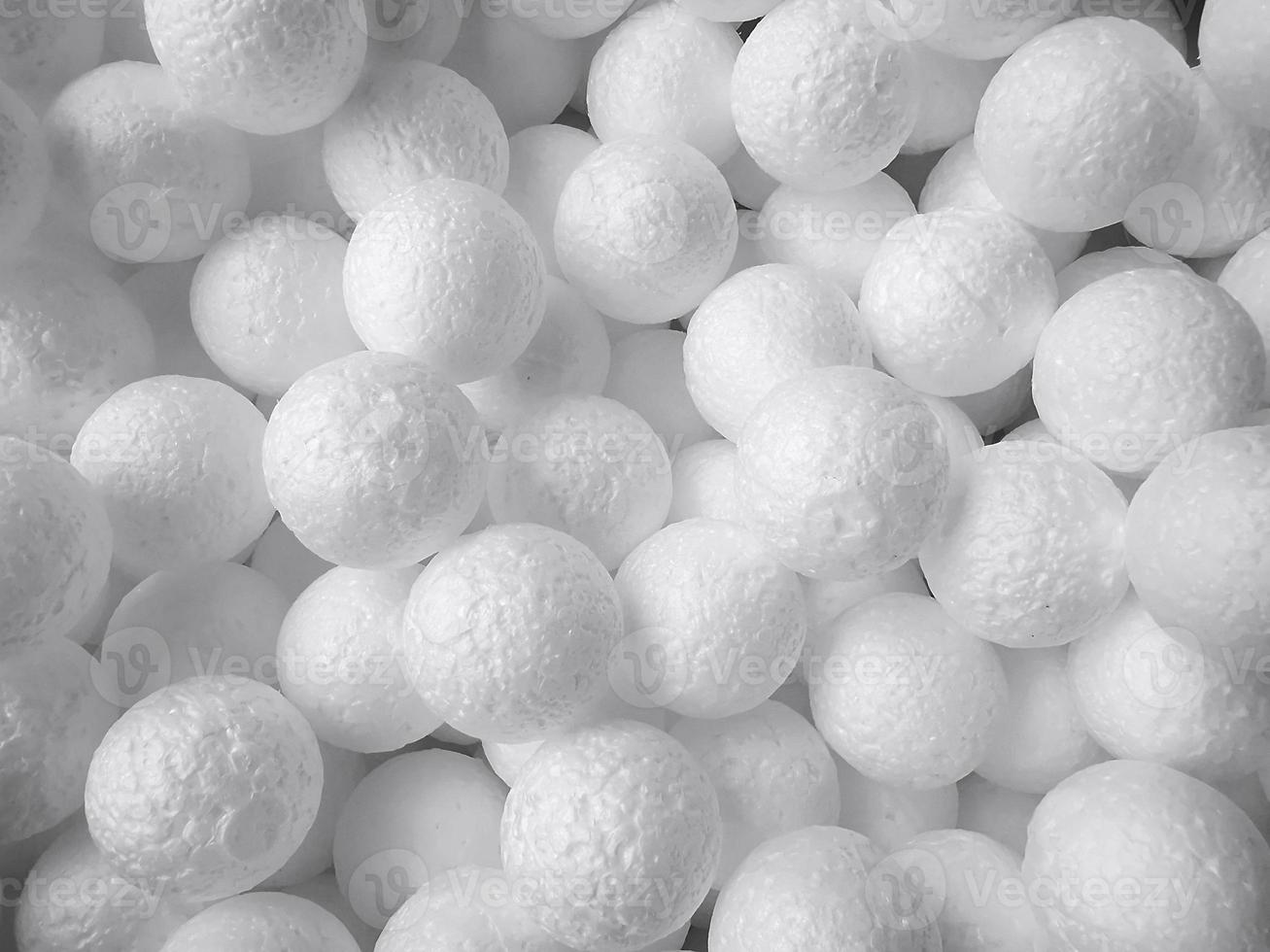Background of white circle styrofoam ball pattern texture foam surface abstract background photo