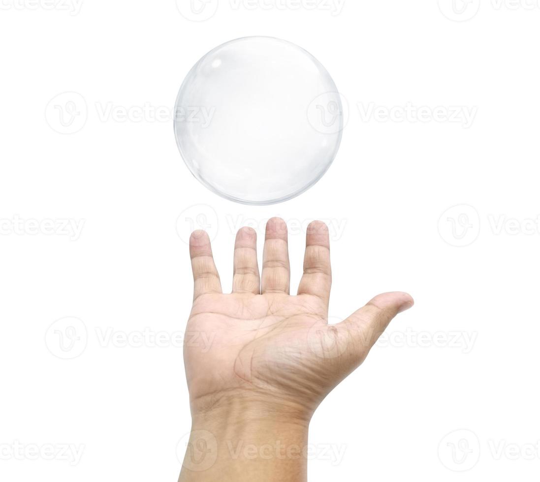 Some people try to catch the bubbles with their hands trying to catch the floating bubbles. photo