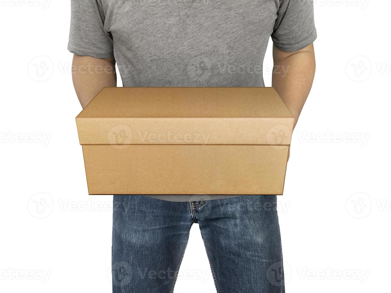 Delivery man holding cardboard boxes isolated on white photo