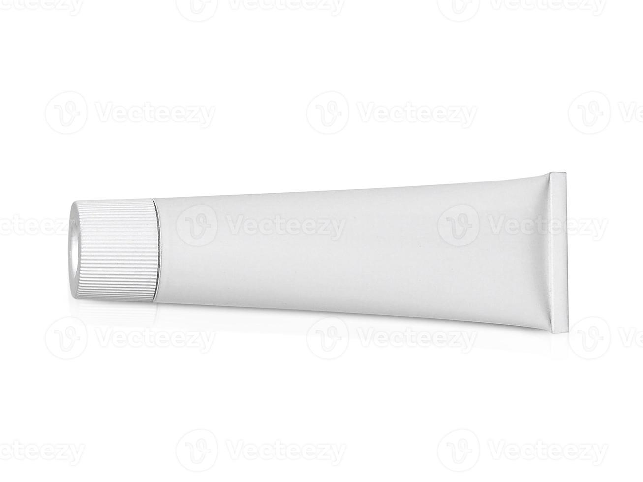 Aluminum cream white tube isolated on white background photo