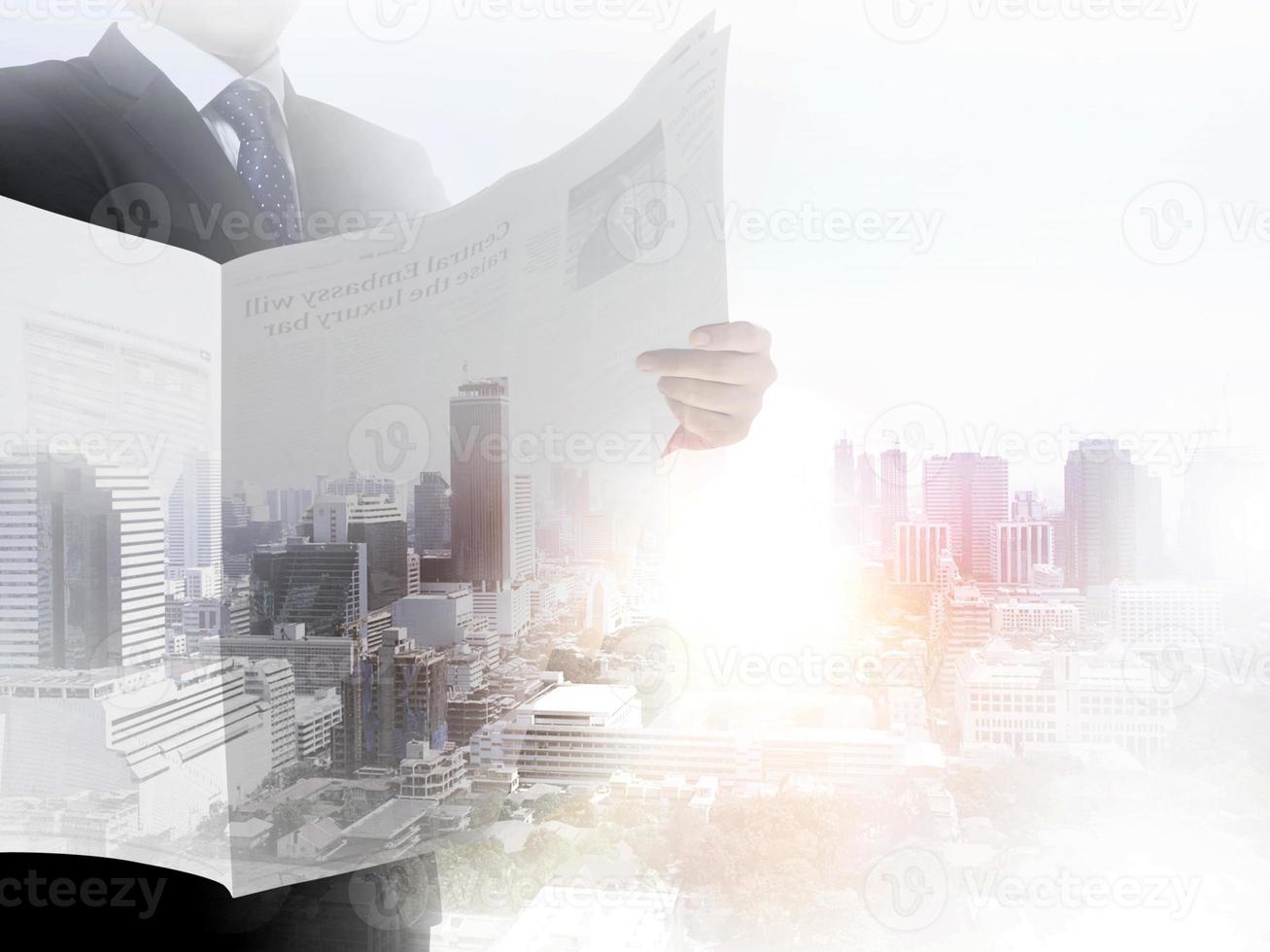 Businessmen. Read newspaper abstract city background photo