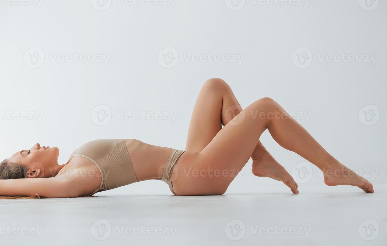 Slim Black Lady with Perfect Body Shape Posing in Underwear Stock