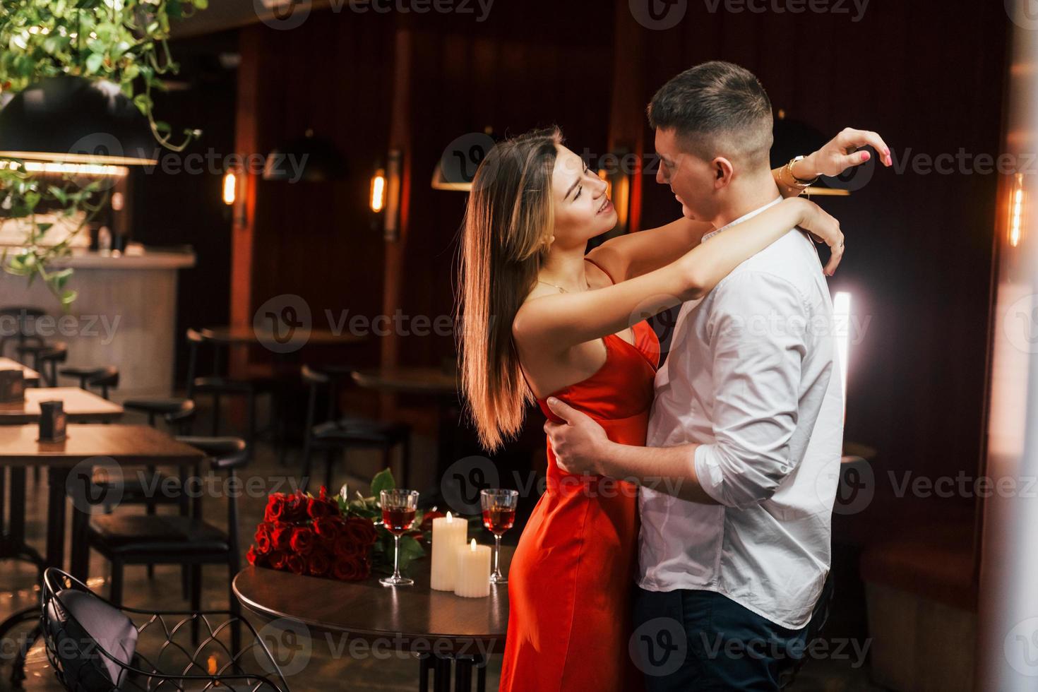 Sincere emotions. Romantic couple have dinner in the restaurant photo