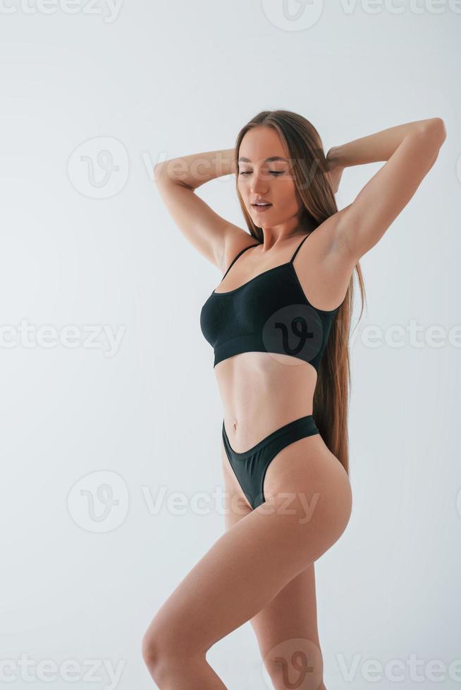 Slim Black Lady with Perfect Body Shape Posing in Underwear Stock