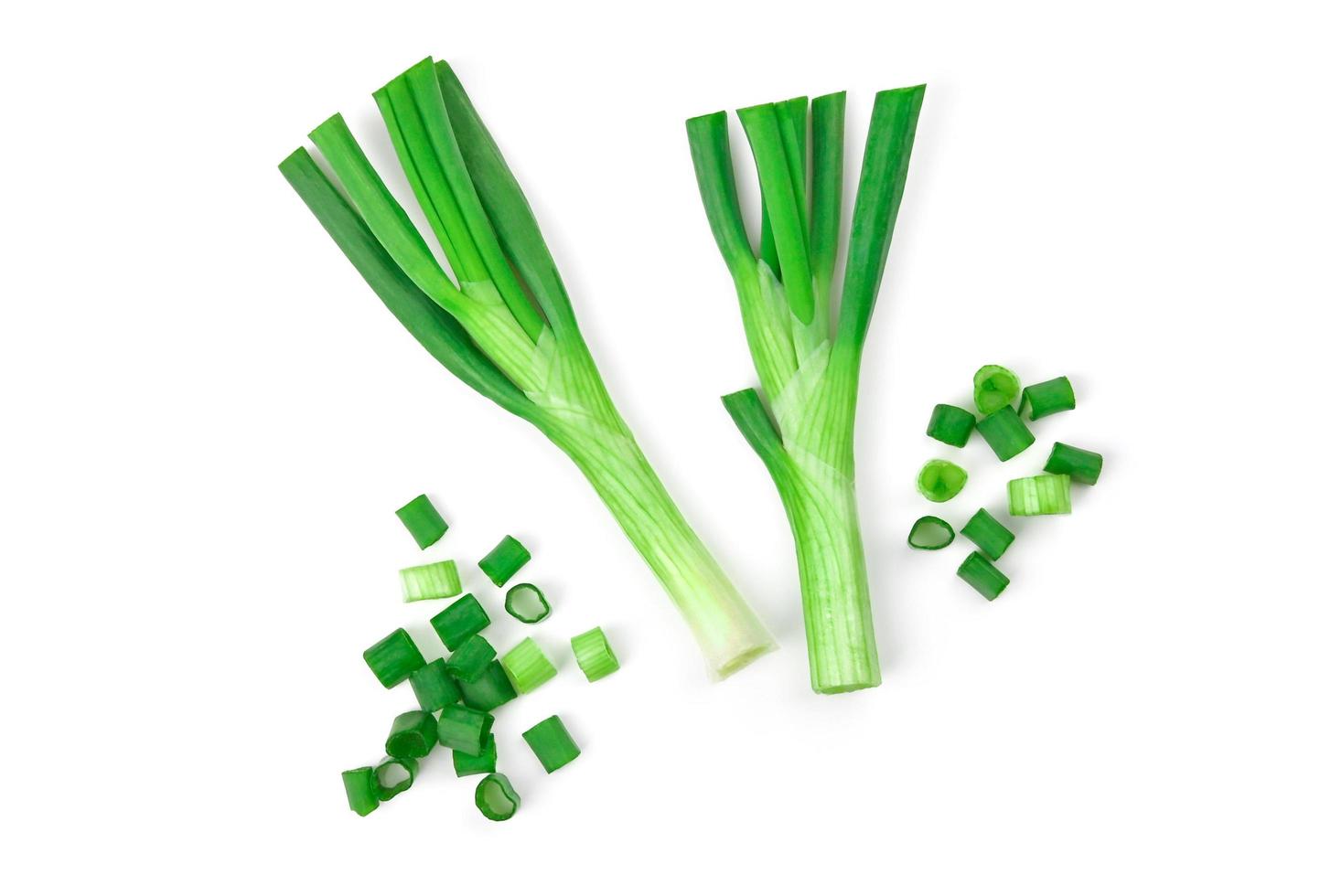 Green spring onions isolated on white background. photo