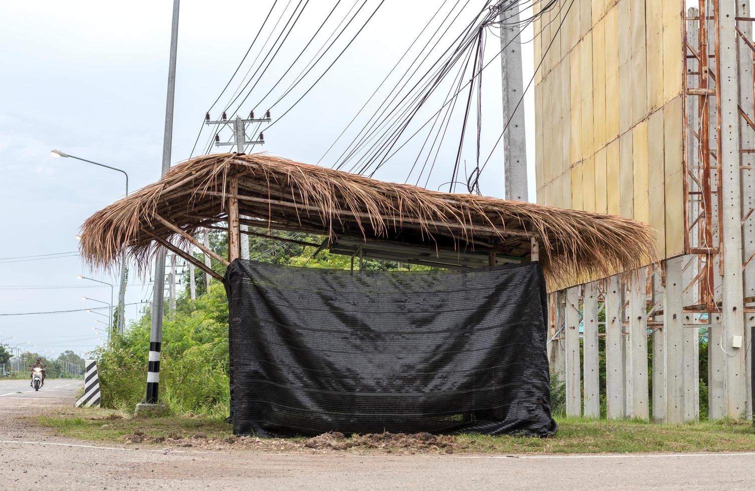 Shelter for shed, vetiver with black shading net. photo