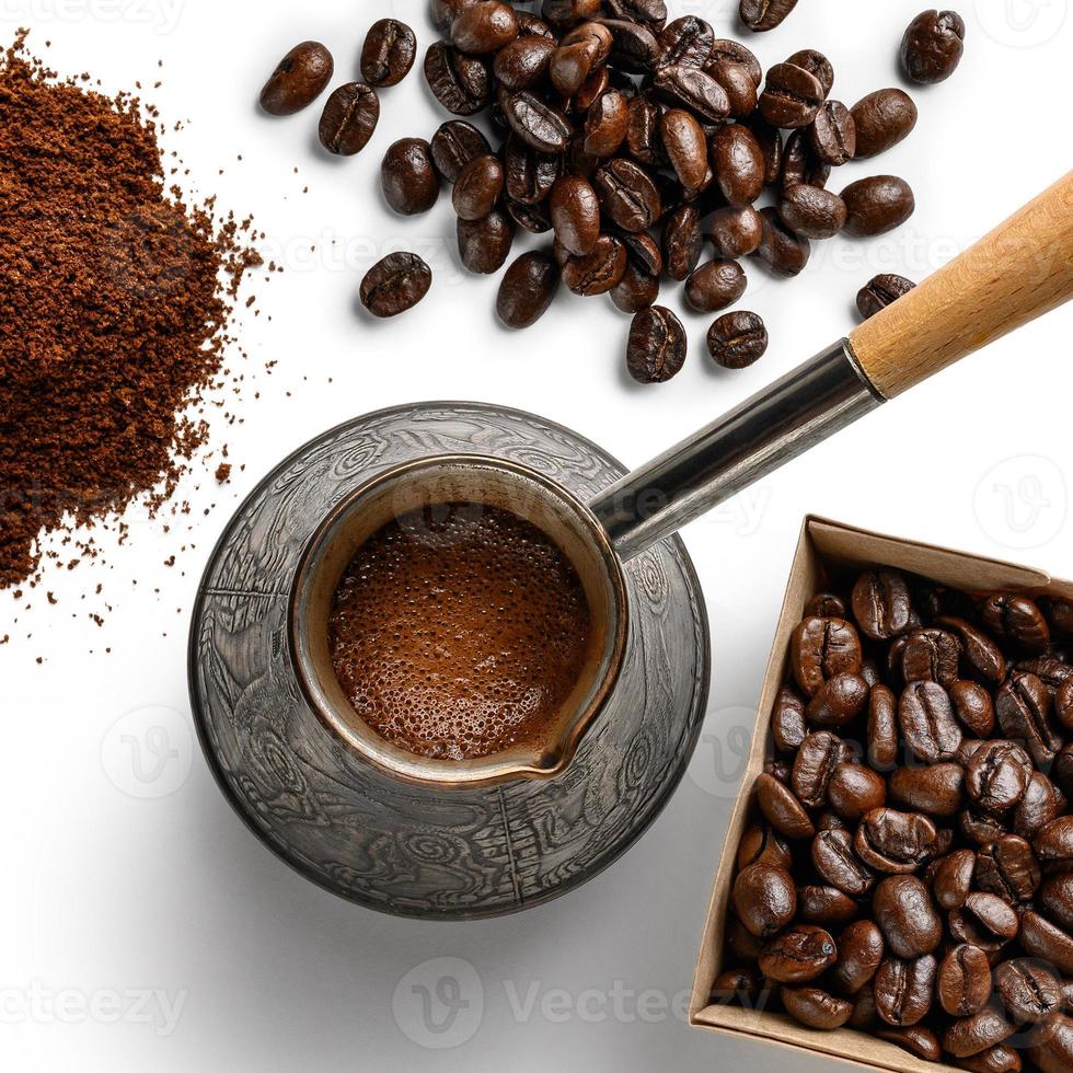 Coffee beans and ground coffee top view on a white background photo