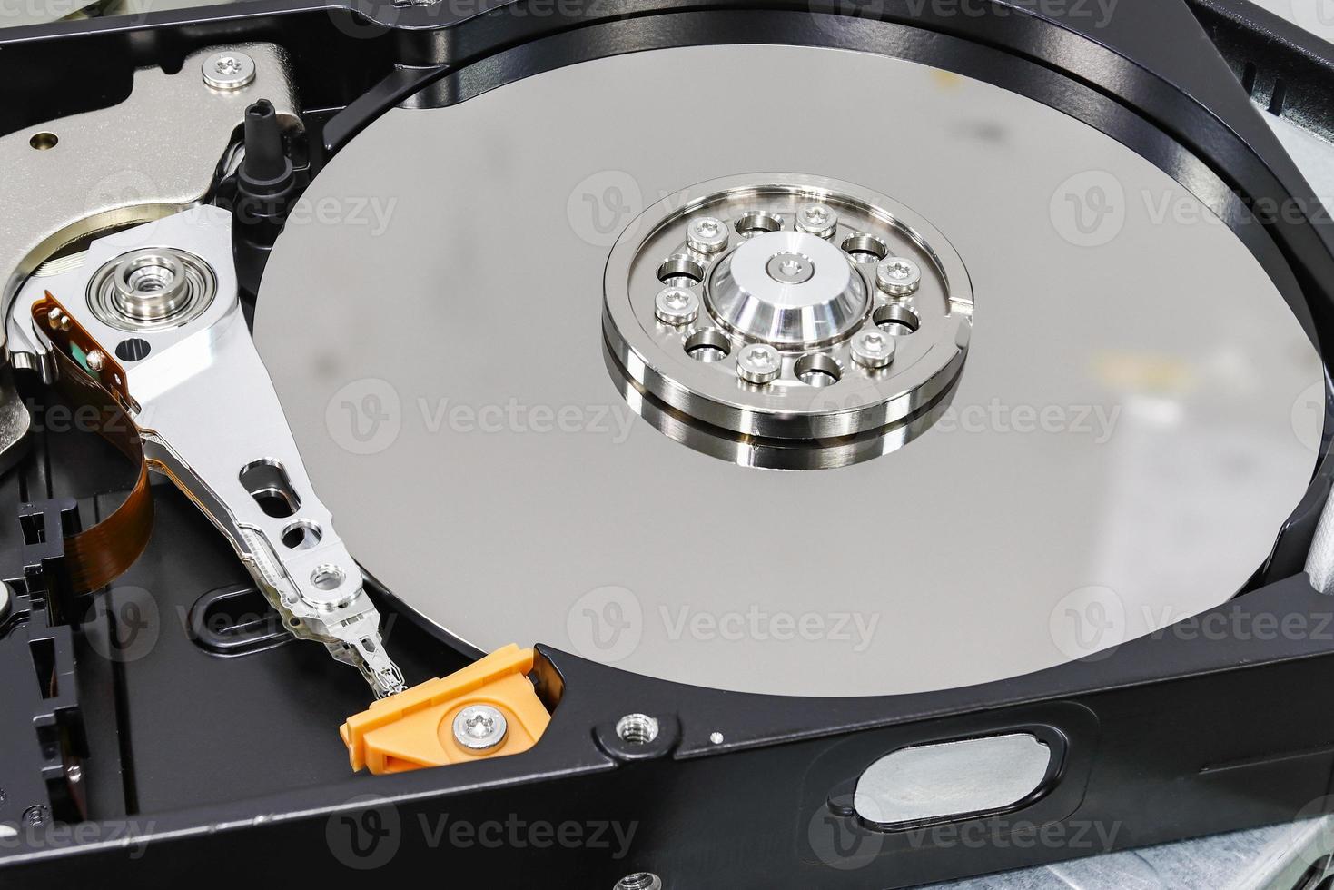Hard disk drive for computer concept Working data storage read write photo