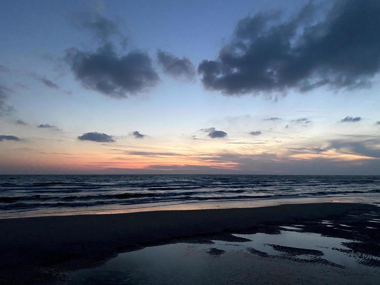 Sunset over the beach view photo