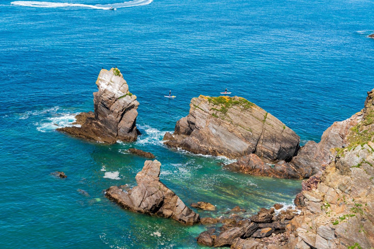 Rocks in the sea near Outer Hope in Devon photo