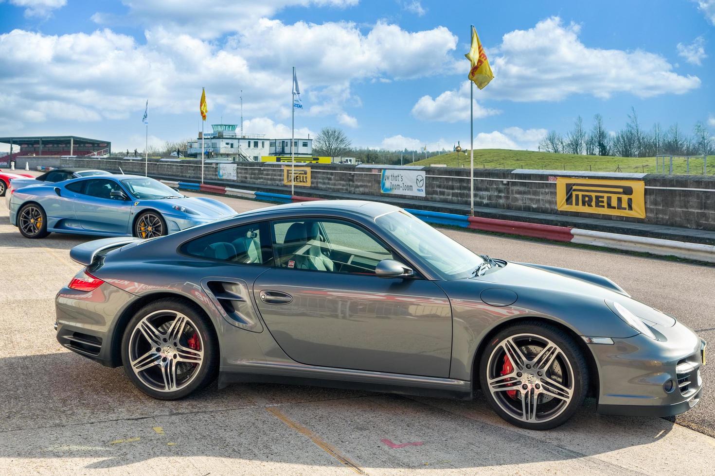 Thruxton, Hampshire, UK, 2009. Side View of Porsche Sports Car at Thruxton Racing Circuit photo