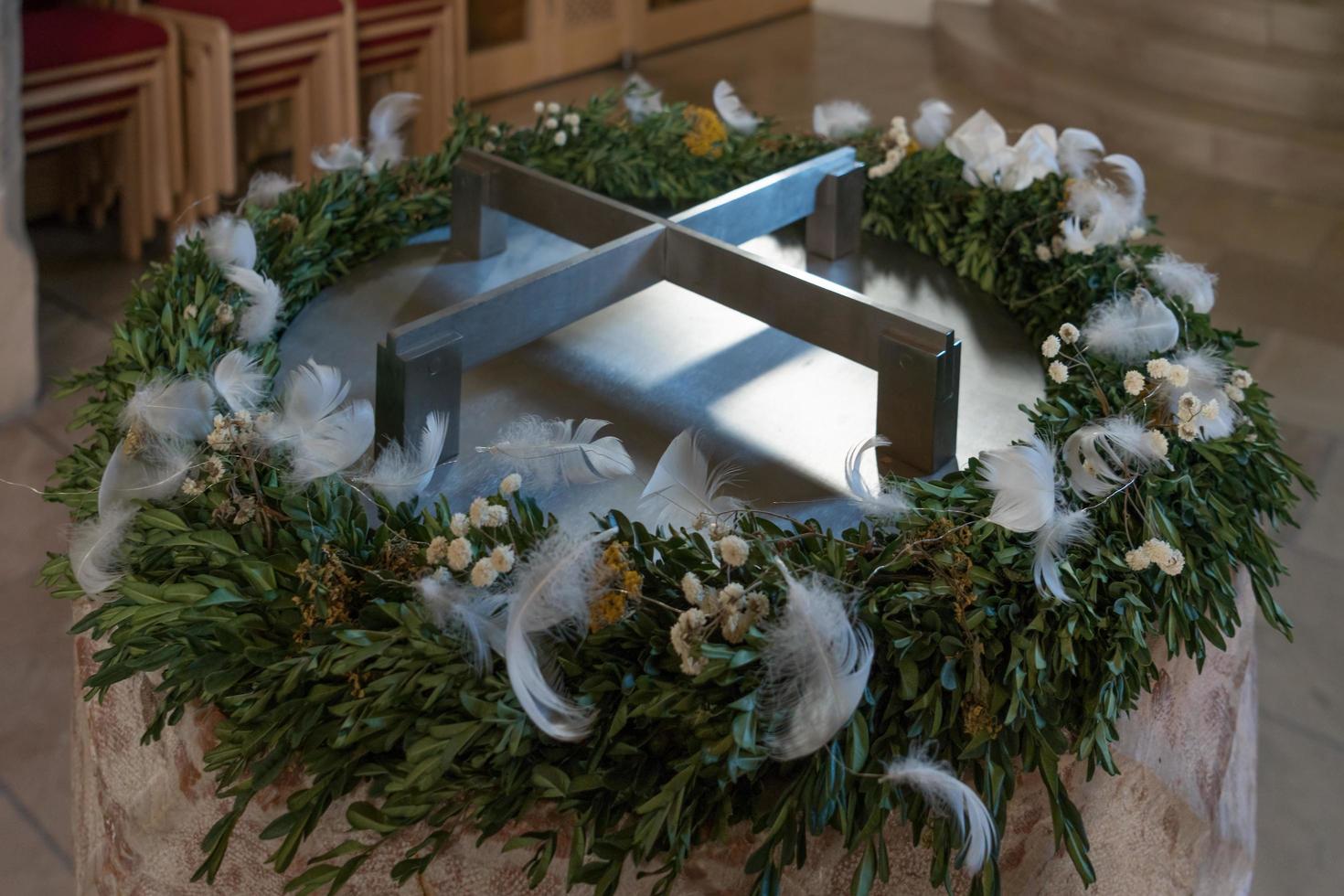 Hallstatt, Austria, 2017. Font in the Maria Hilf Pilgrimage Church in Hallstatt photo