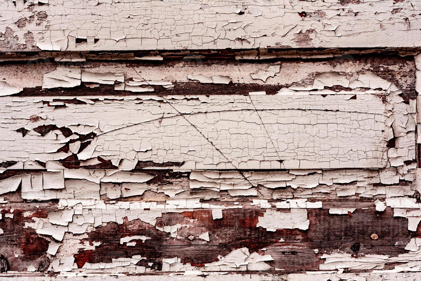 Wooden texture with scratches and cracks. It can be used as a background photo