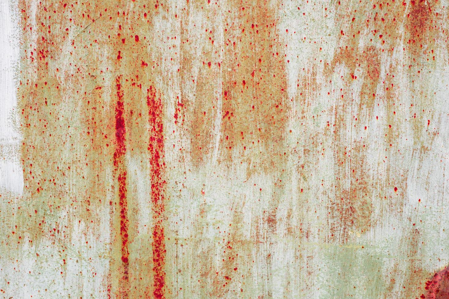 Metal texture with scratches and cracks which can be used as a background photo