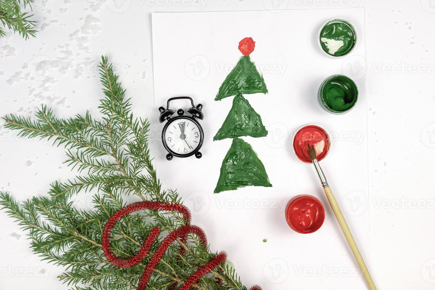 kids drawing, christmas tree and alarm clock photo