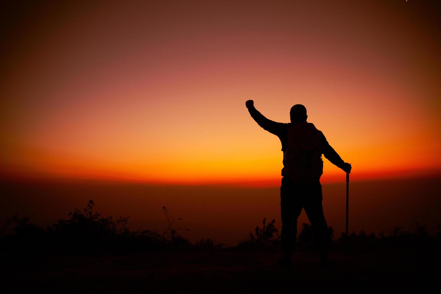 Hiker with backpack photo