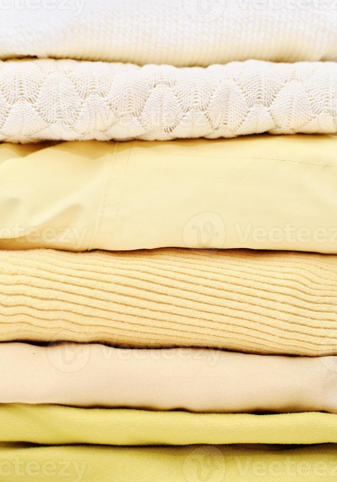 clothes in trendy colors of the 2021 in stack. photo