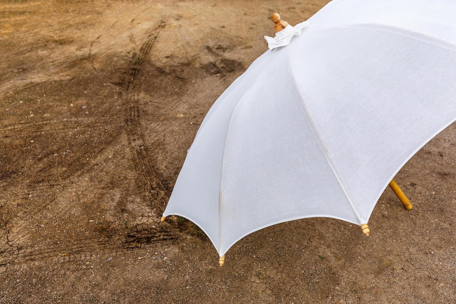 White umbrella on the floor photo