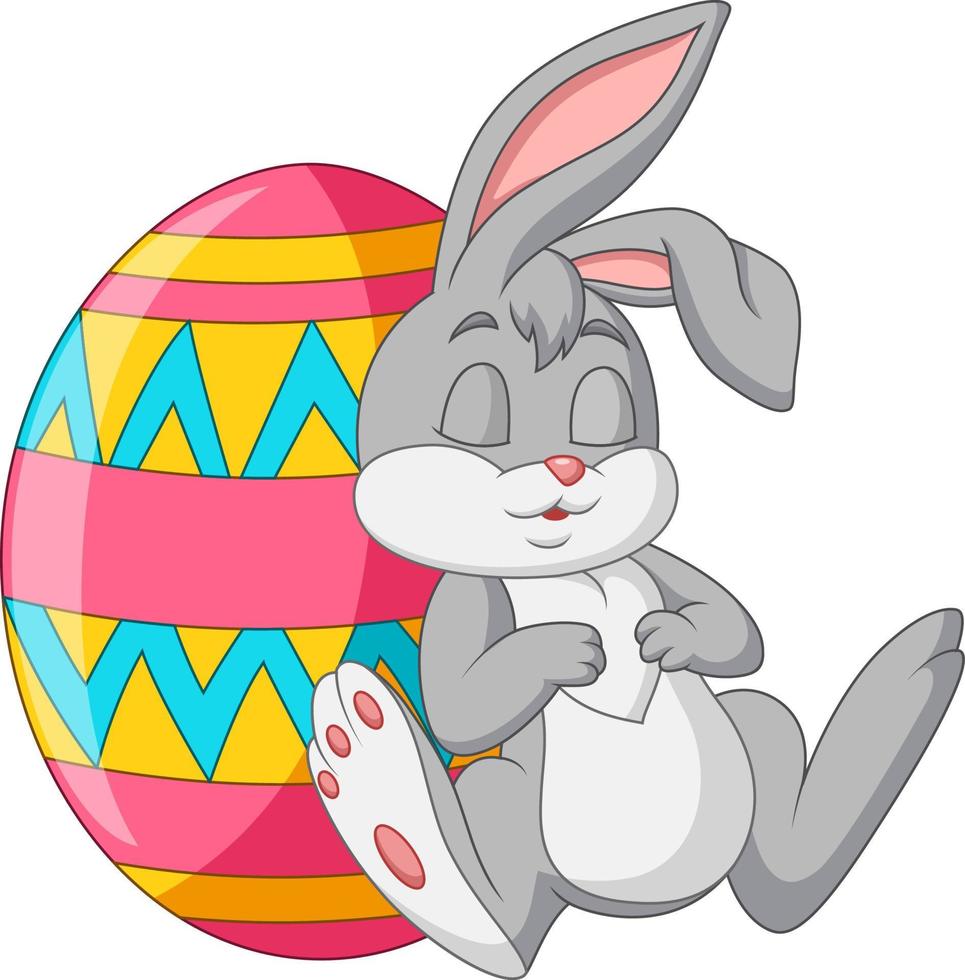 Cute rabbit sleeping beside an Easter egg vector