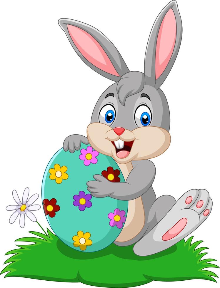 Cartoon bunny holding Easter egg vector