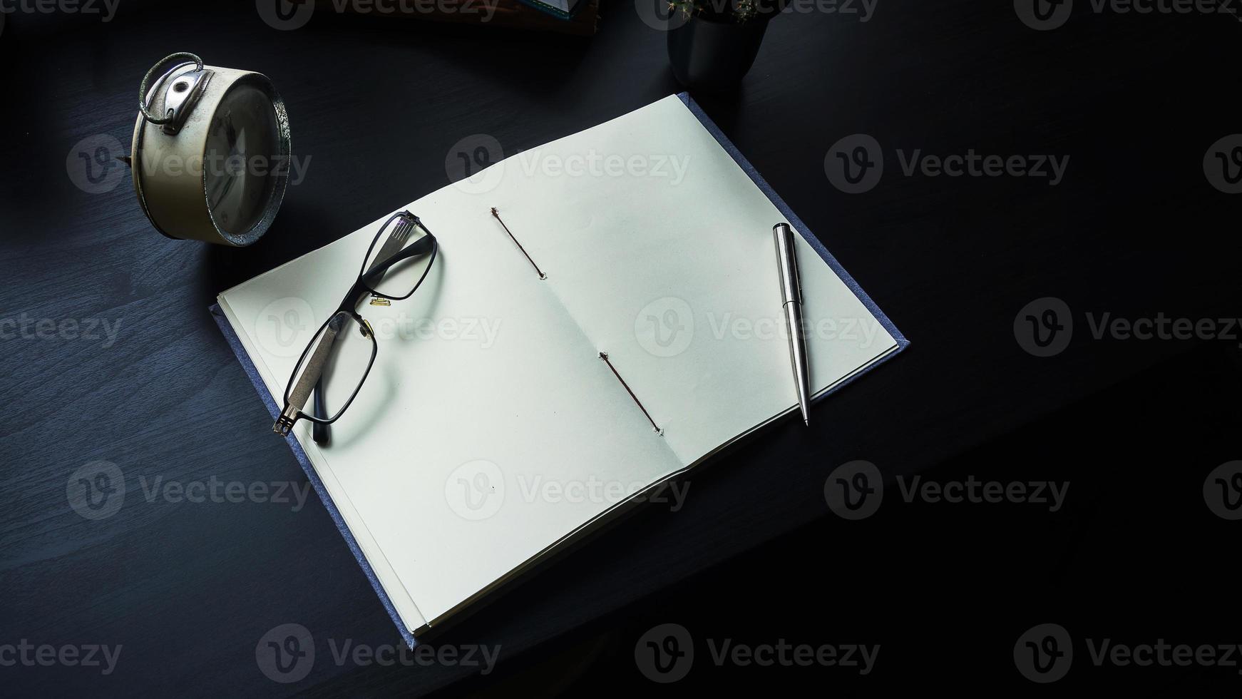 Notebook on the desk , Empty space on the notebook for Enter text or image photo