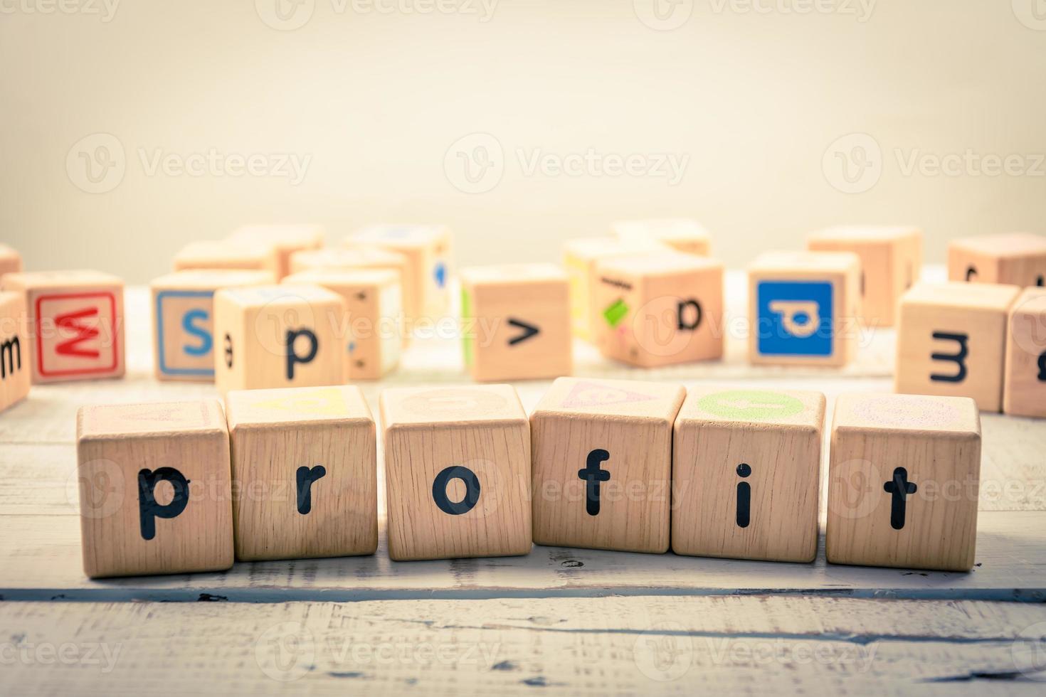 Word  profit wood Cubic on the wood photo