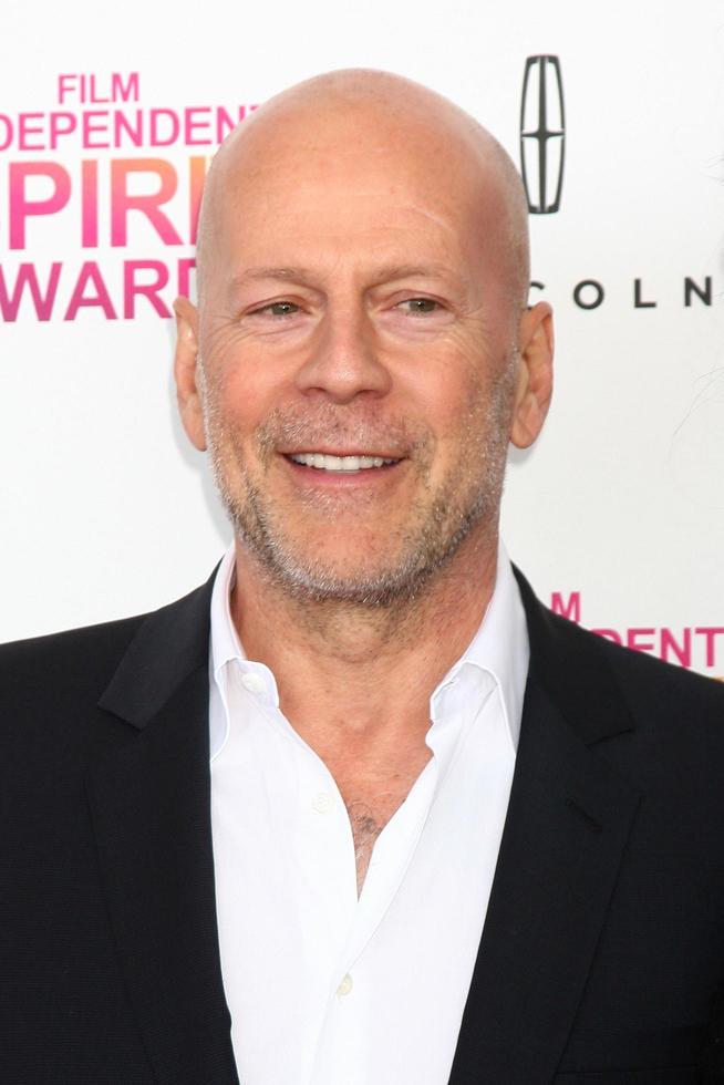 LOS ANGELES, FEB 23 - Bruce Willis, Emma Heming attends the 2013 Film Independent Spirit Awards at the Tent on the Beach on February 23, 2013 in Santa Monica, CA photo