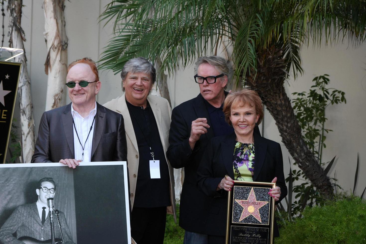 LOS ANGELES, SEP 7 - Peter Asher, Phil Everly, Gary Busey, Maria Elena Holly at the Buddy Holly Walk of Fame Ceremony at the Hollywood Walk of Fame on September 7, 2011 in Los Angeles, CA photo