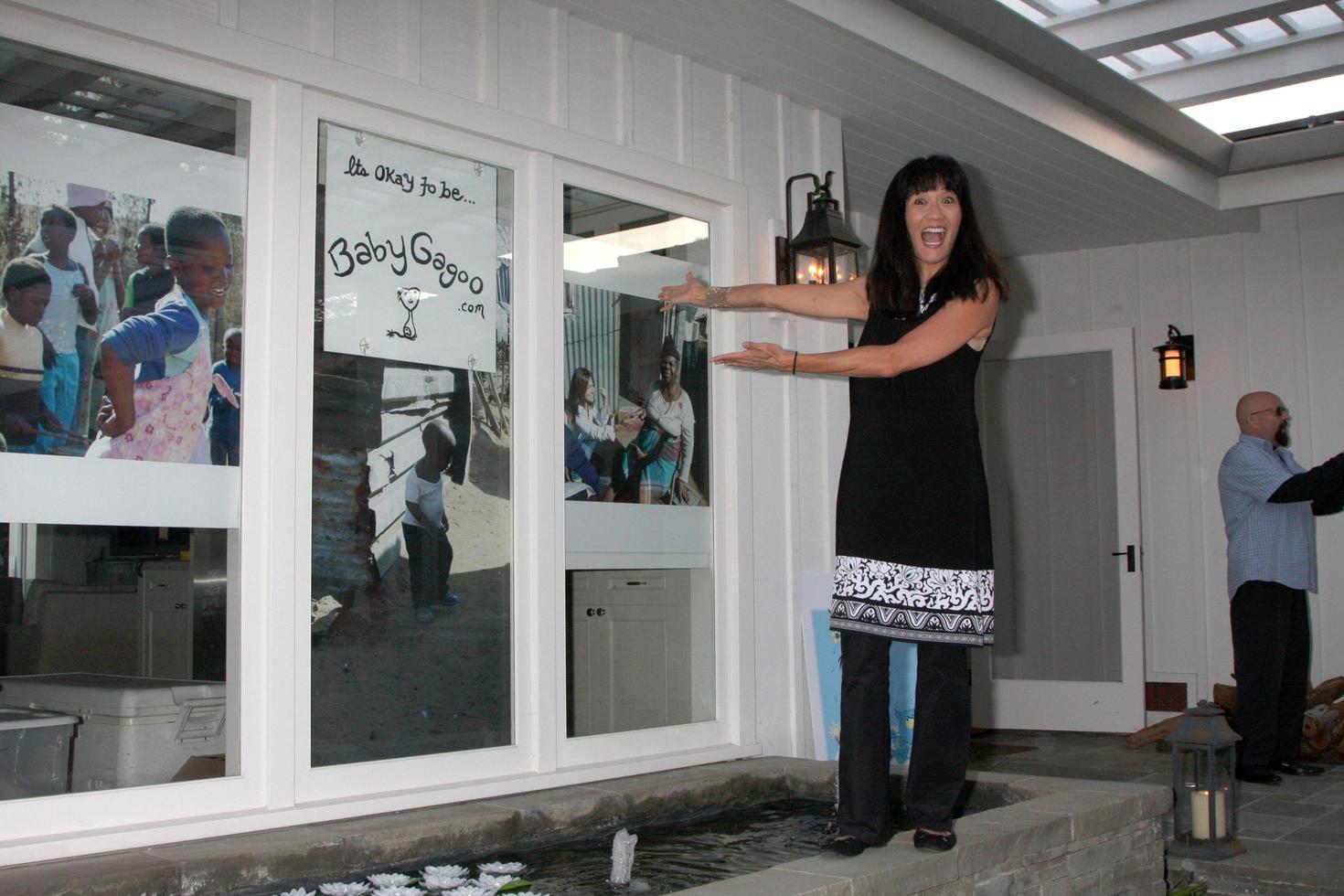 LOS ANGELES, APR 28 - Suzanne Whang at the Launch of Baby Gagoo Clothing Line by Vanessa Marcil-Giovinazzo at private home on April 28, 2012 in Malibu, CA photo