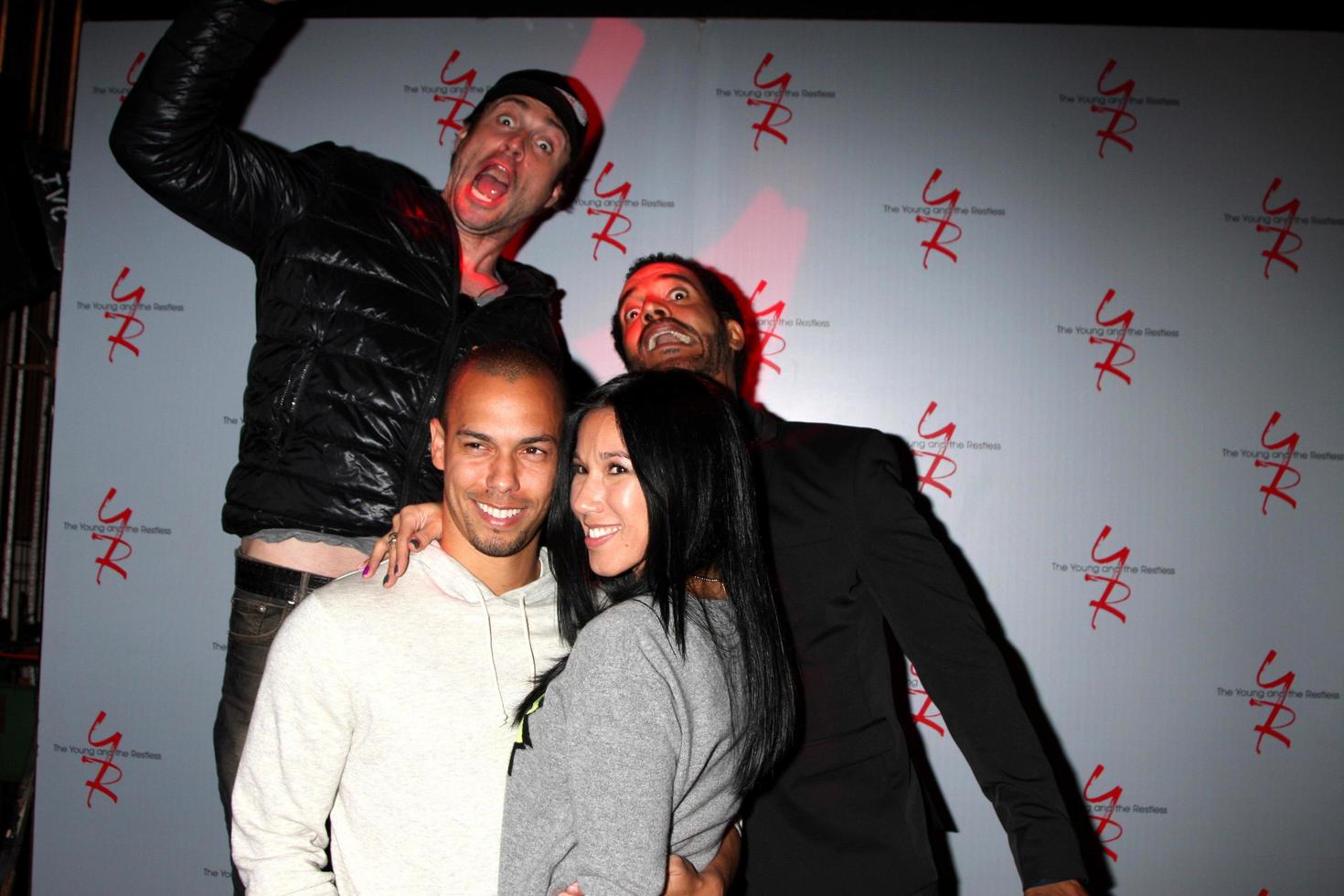LOS ANGELES, MAR 25 - Bryton James, Guest, Daniel Goddard, Kristoff St John at the Young and Restless 41st Anniversary Cake at CBS Television City on March 25, 2014 in Los Angeles, CA photo