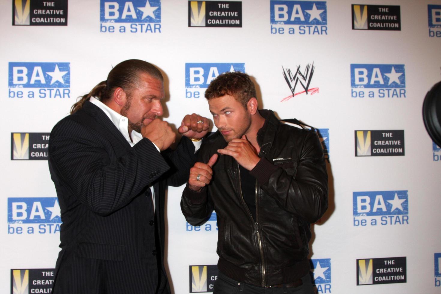 LOS ANGELES, AUG 11 - Triple H, Kellan Lutz arriving at the be A STAR Summer Event at Andaz Hotel on August 11, 2011 in Los Angeles, CA photo