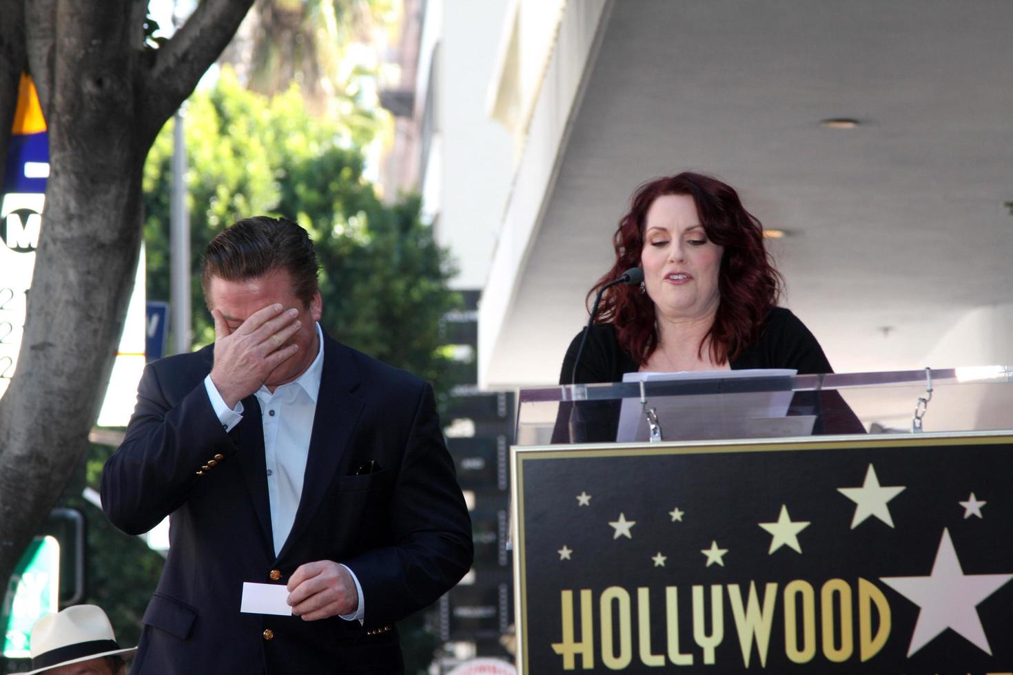 LOS ANGELES  FEB 14 - Alec Baldwin, Megan Mullally at the Walk of Fame Star Ceremony for Alec Baldwin at Beso Resturant on February 14, 2011 in Los Angeles, CA photo