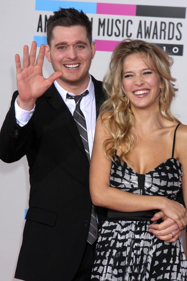 LOS ANGELES  NOV 21 - Michael Buble and Fiance arrives at the 2010 American Music Awards at Nokia Theater on November 21, 2010 in Los Angeles, CA photo