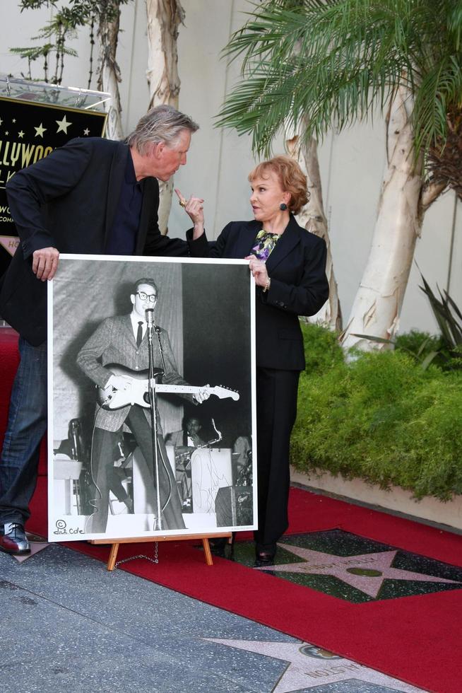 LOS ANGELES, SEP 7 - Gary Busey, Maria Elena Holly at the Buddy Holly Walk of Fame Ceremony at the Hollywood Walk of Fame on September 7, 2011 in Los Angeles, CA photo