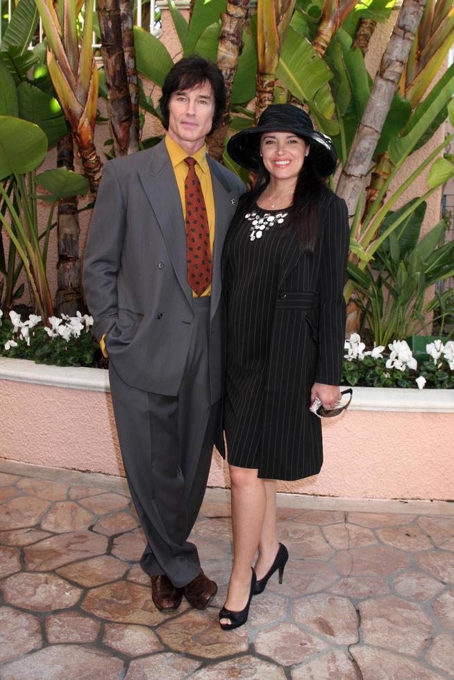 LOS ANGELES, FEB 20 - Ronn Moss, Devin DeVasquez arrives at the 2011 Catholics in Media Associates Award Brunch at Beverly HIlls Hotel on February 20, 2011 in Beverly Hills, CA photo