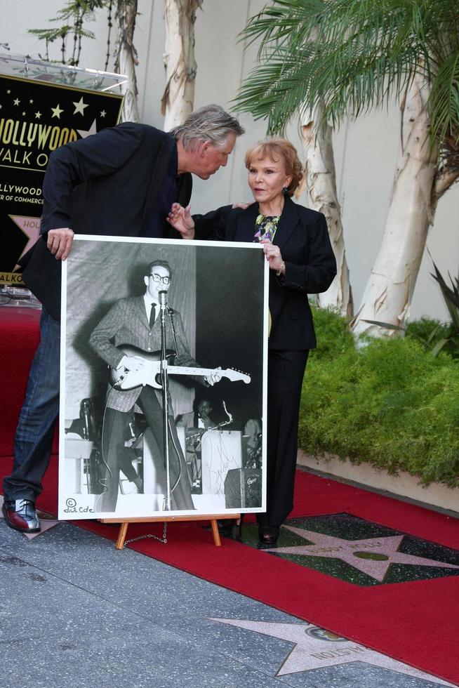 LOS ANGELES, SEP 7 - Gary Busey, Maria Elena Holly at the Buddy Holly Walk of Fame Ceremony at the Hollywood Walk of Fame on September 7, 2011 in Los Angeles, CA photo