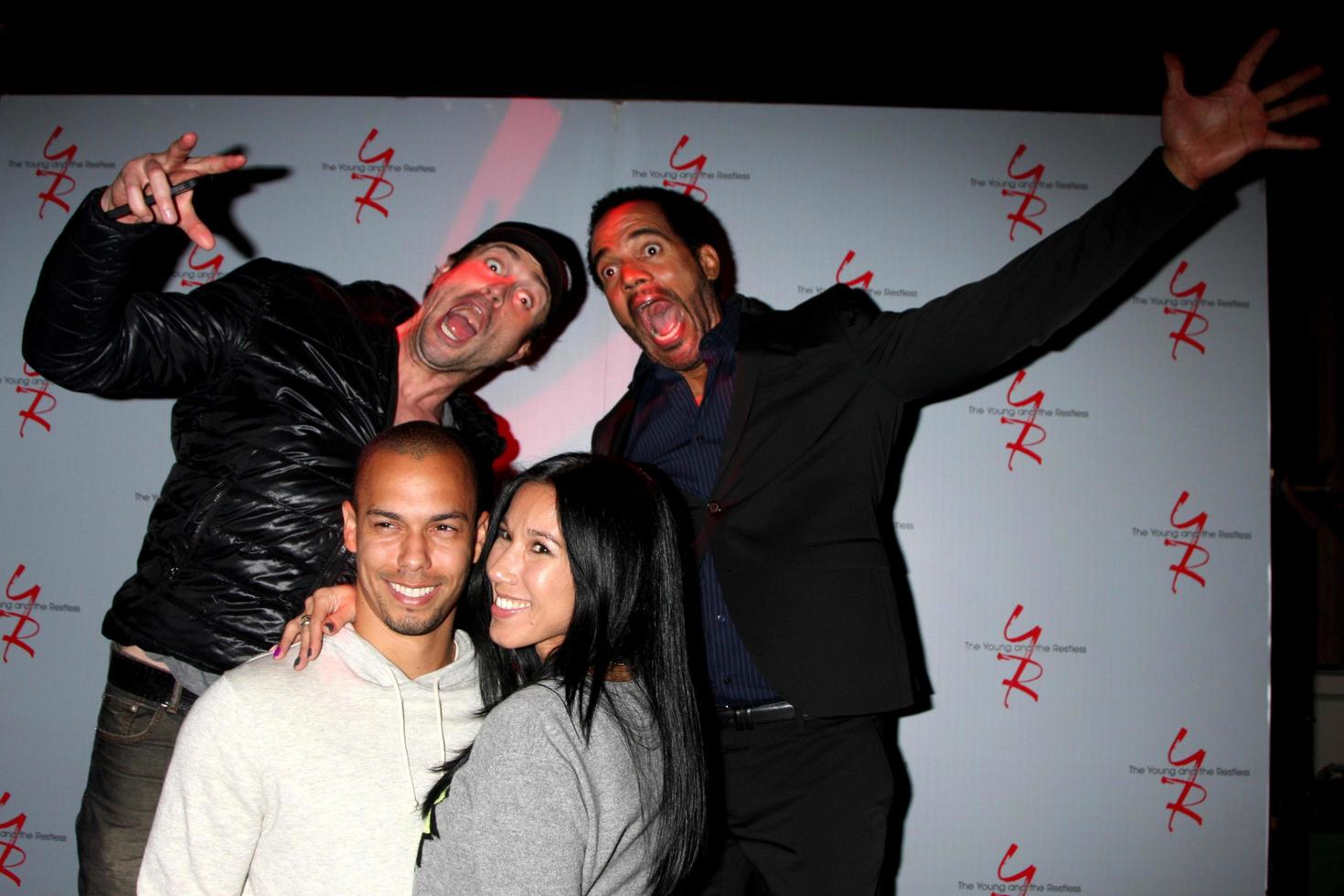 LOS ANGELES, MAR 25 - Bryton James, Guest, Daniel Goddard, Kristoff St John at the Young and Restless 41st Anniversary Cake at CBS Television City on March 25, 2014 in Los Angeles, CA photo