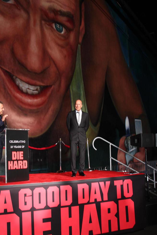 LOS ANGELES, JAN 31 - Bruce Willis at the A Good Day to Die Hard mural unveiling event at the 20th Century Fox Studios on January 31, 2013 in Los Angeles, CA. photo