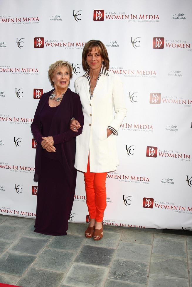 LOS ANGELES, APR 23 - Cloris Leachman, Wendie Malick arrives at the 2013 Genii Awards presented by the Aliance for Women in Media at the Skirball Cultural Center on April 23, 2013 in Los Angeles, CA photo