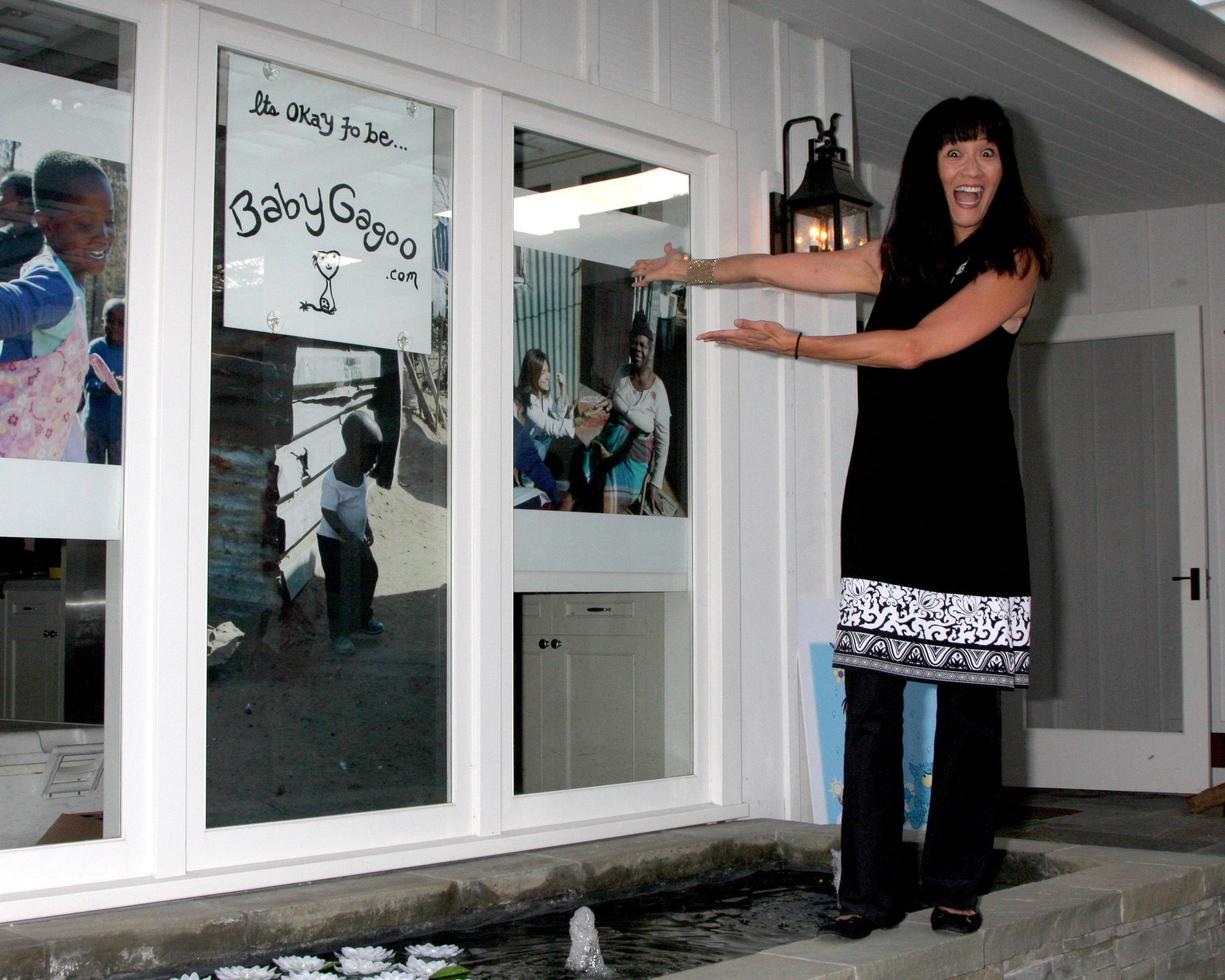 LOS ANGELES, APR 28 - Suzanne Whang at the Launch of Baby Gagoo Clothing Line by Vanessa Marcil-Giovinazzo at private home on April 28, 2012 in Malibu, CA photo