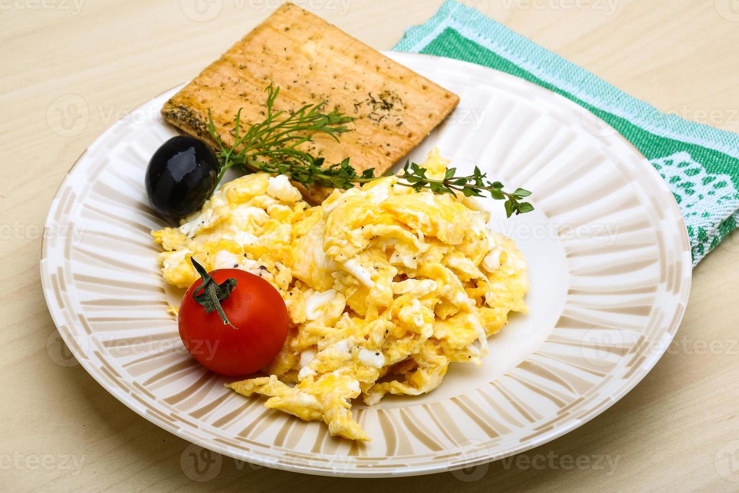 Scrambled eggs with tomato photo